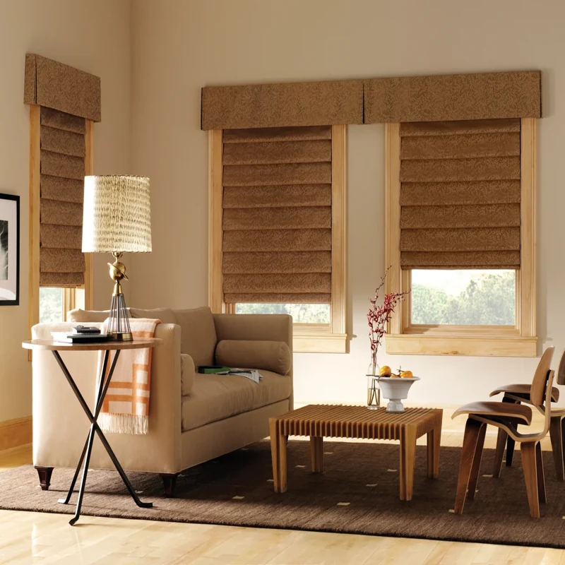 Brown patterned Roman shades with matching valances