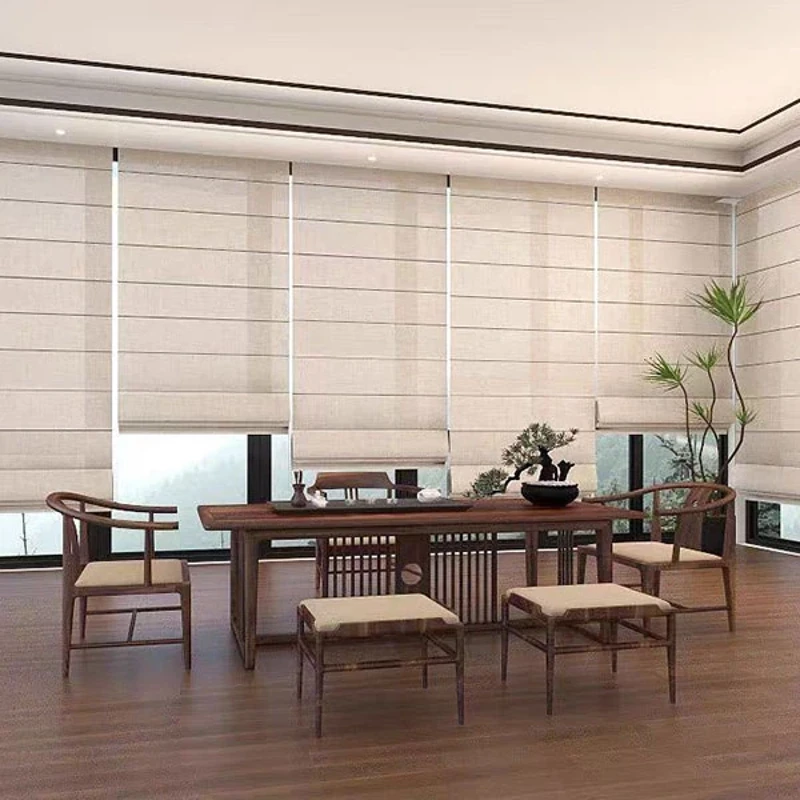 Neutral Roman shades in a large, Zen-style dining room