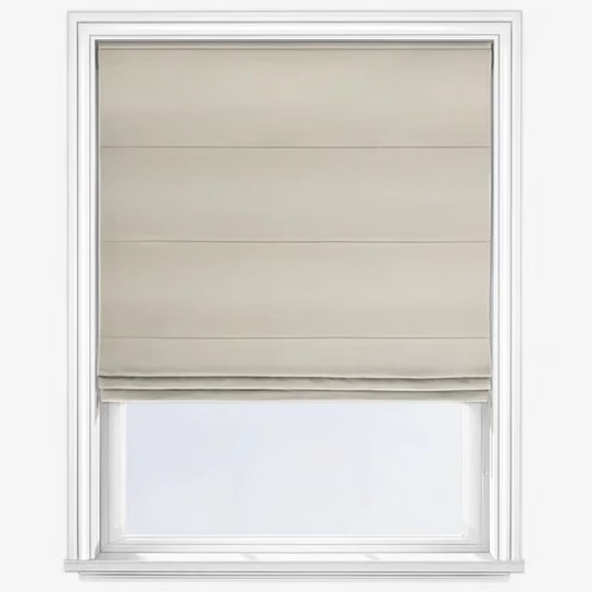 Roman blind in cream fabric mounted on a window