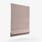 Side view of a dusty rose Roman fabric blind